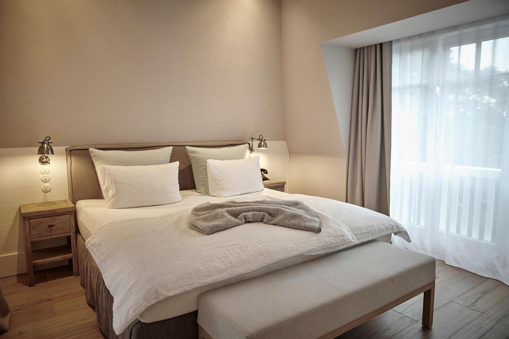 The Cozy Hotel & Lofts Тиммендорфер-Штранд Экстерьер фото